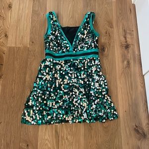 Sparkly green and black dance costume